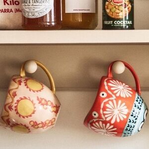 2 Anthropologie coffee/tea cups Nayla Handpainted Pink Coral yellow orange